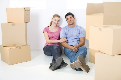 Happy customer receiving moving truck services in Harringay
